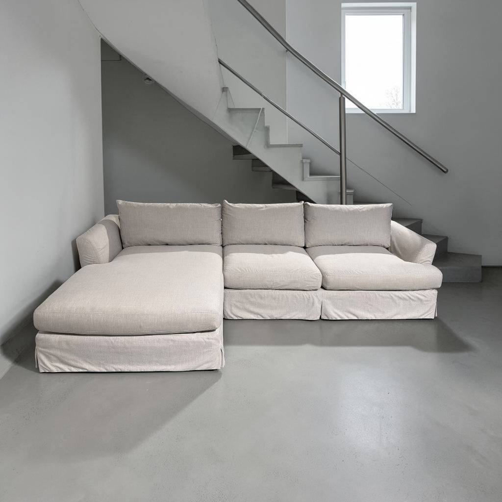 Arhaus Slipcovered Helena 122” 2 Piece Sofa Chaise Sectional in Natural Coastal Linen.