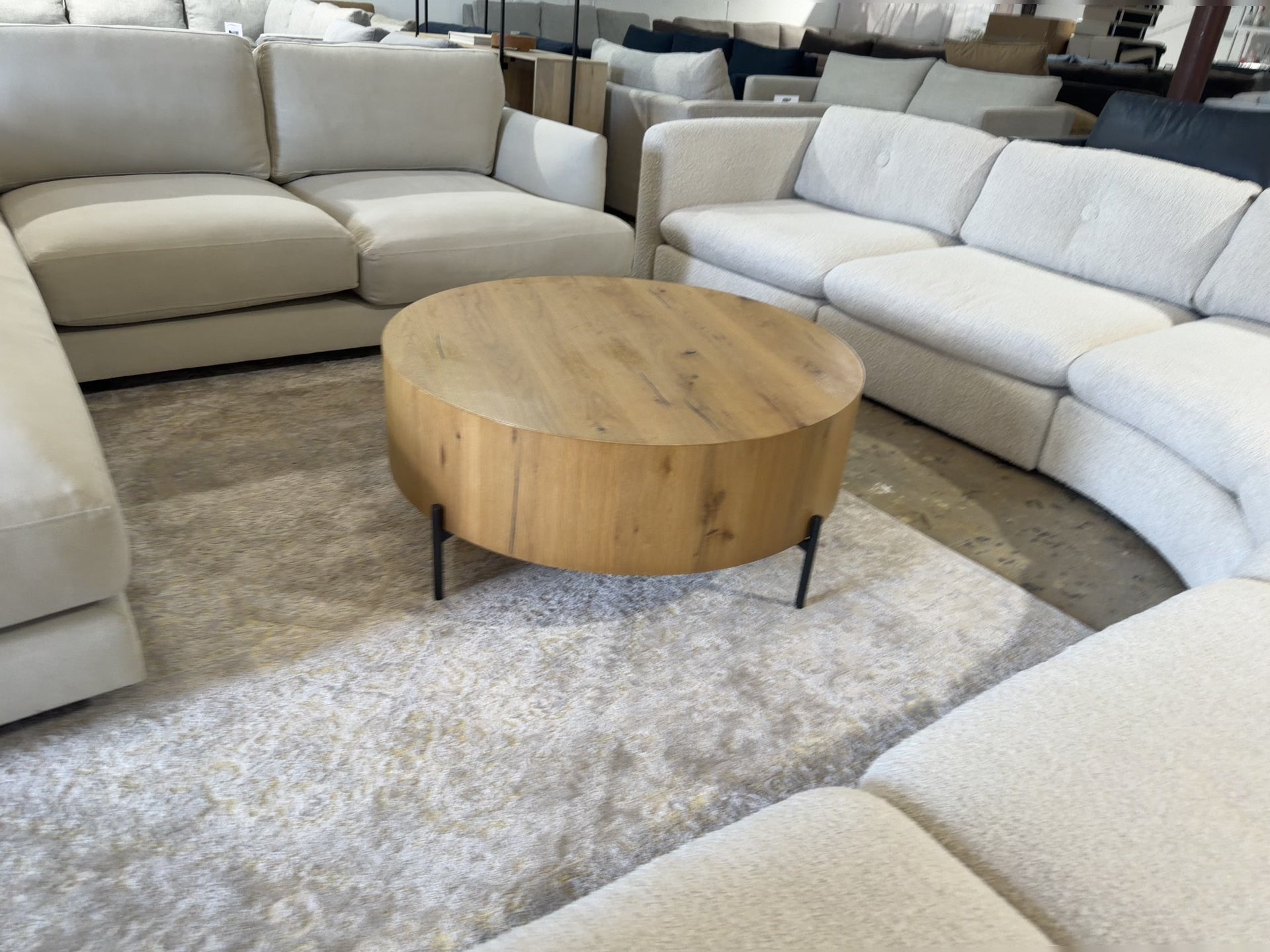 Four Hands Eaton Round Coffee Table in Light Oak Resin and Dark Gunmetal