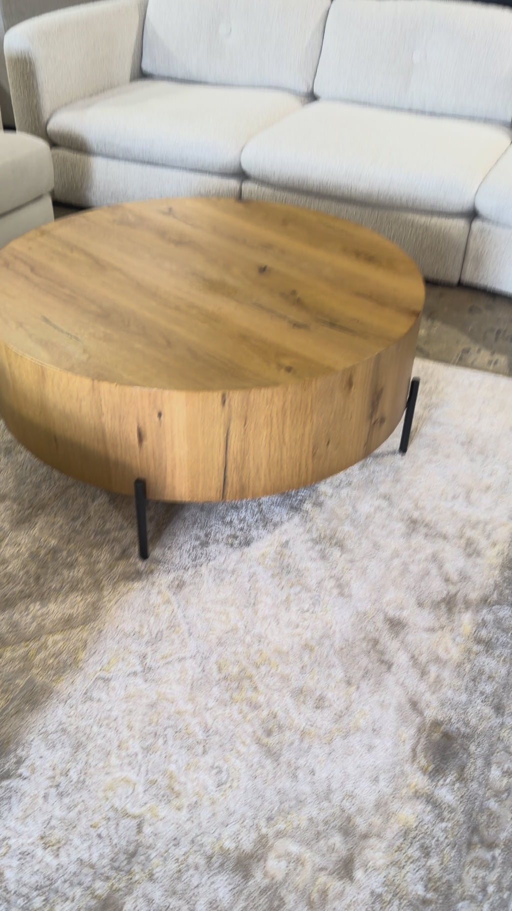 Four Hands Eaton Round Coffee Table in Light Oak Resin and Dark Gunmetal